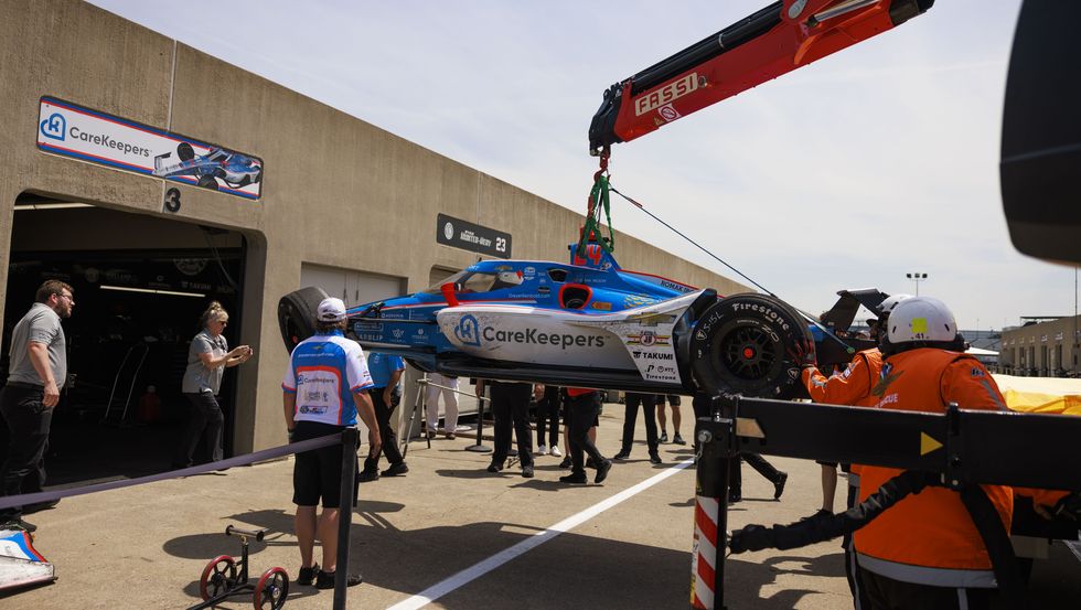 driver stefan wilson 24 car is brought to his garage after