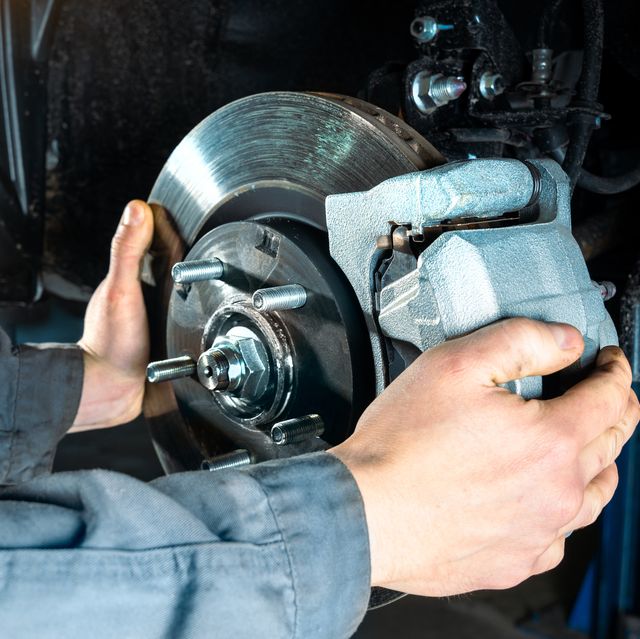 checking the brake discs of a modern car vehicle braking system