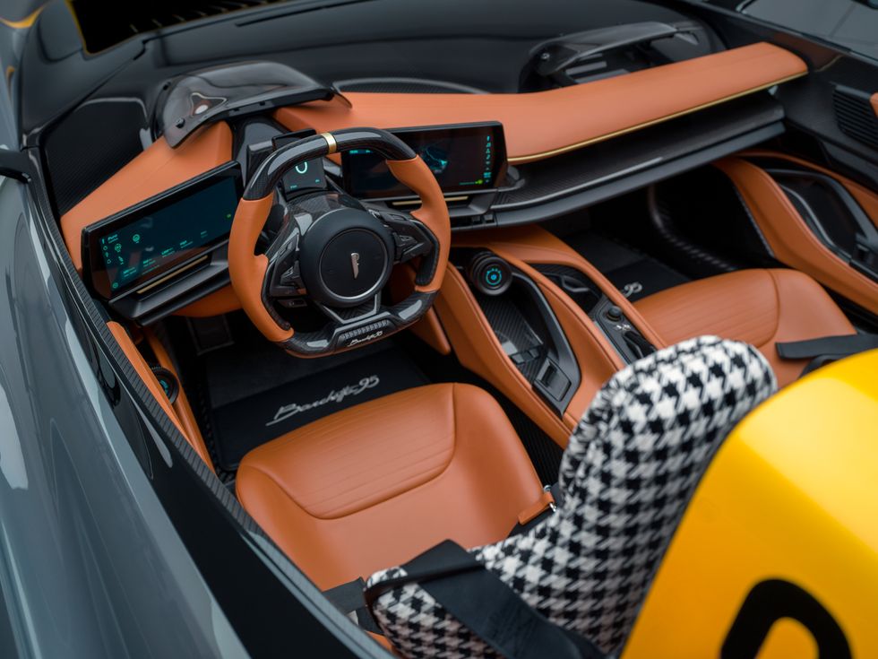 pininfarina b95 interior with houndstooth and rich brown leather