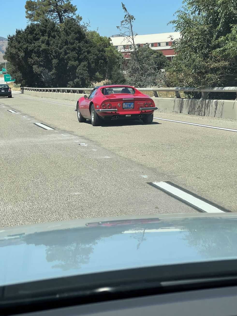 ferrari on road pebble beach 2023