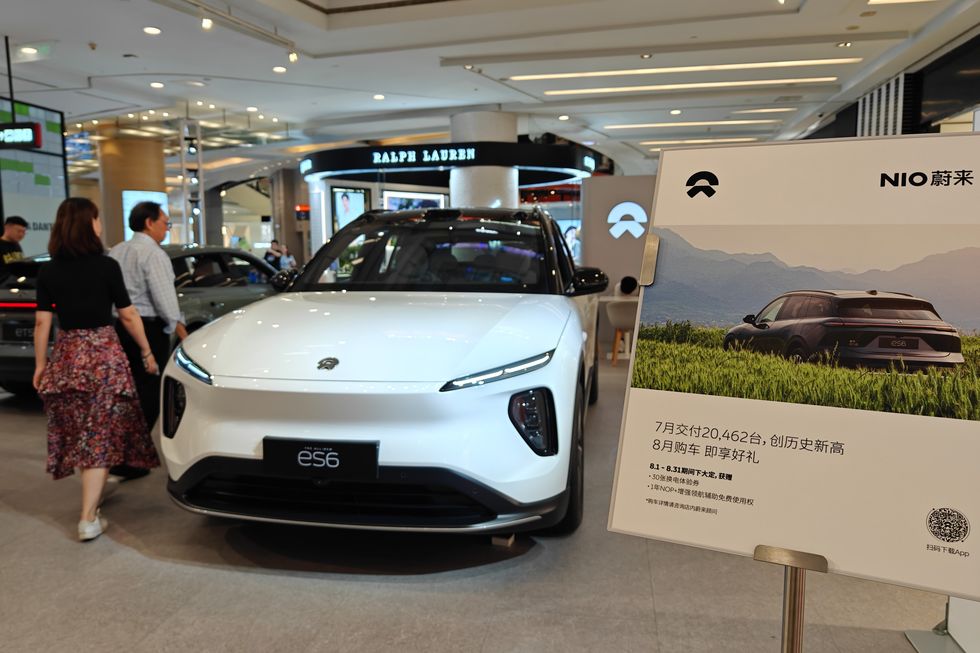 customers shop at nio store in shanghai